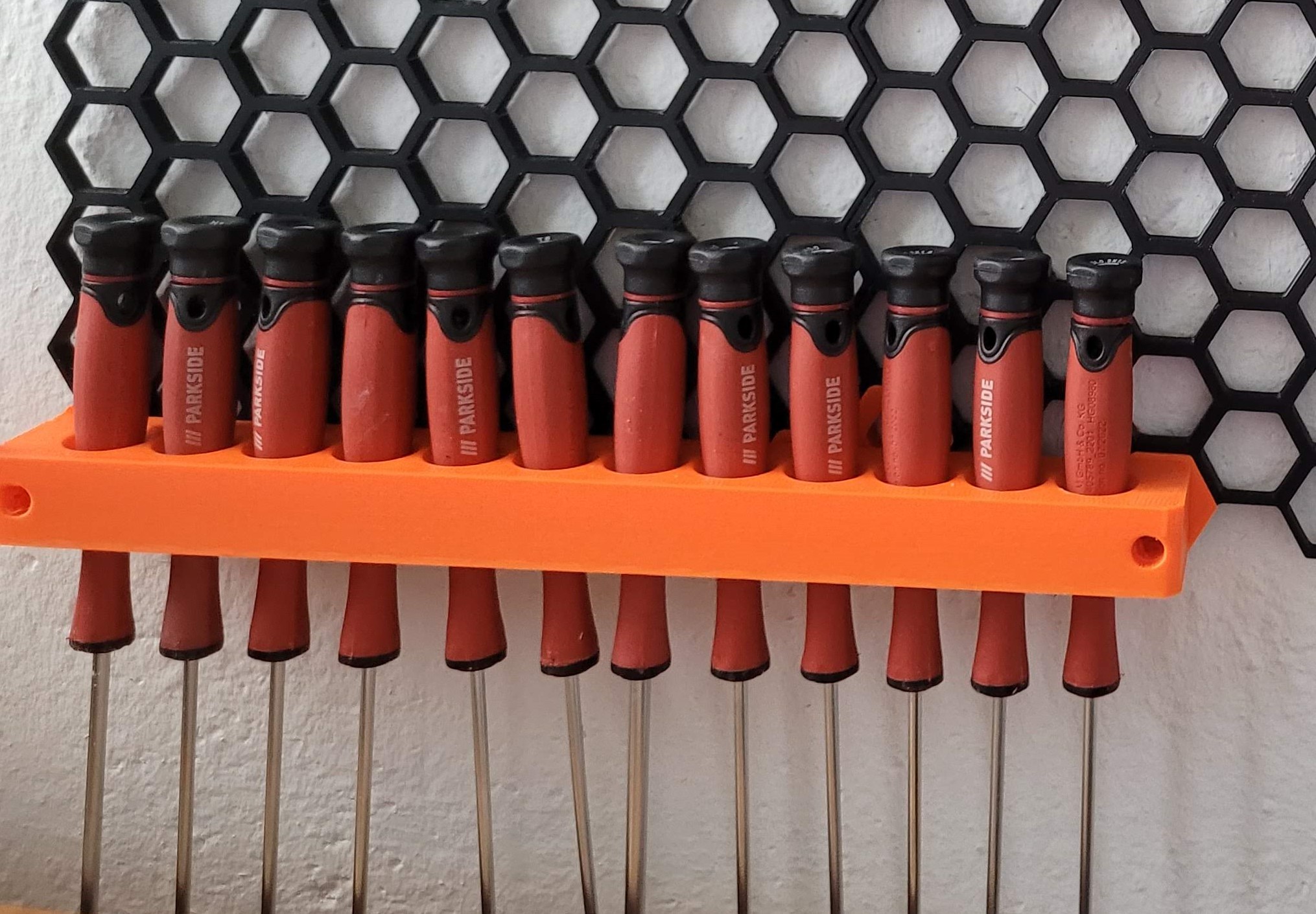 Precision screw driver holder for Honeycomb storage wall by Vladimír