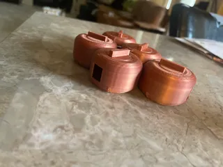 "Cable puck" print-in-place cable management