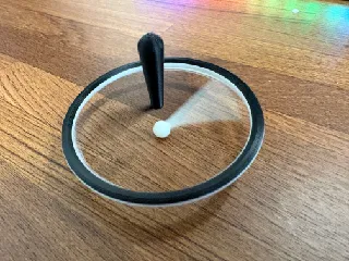 Exclamation mark spinning top