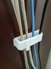 Print-in-place springy cable mount