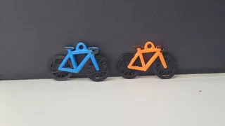 Spinning Wheel Bike Keychain