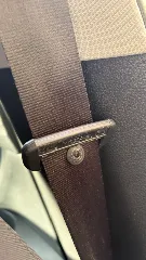 Seatbelt stop button