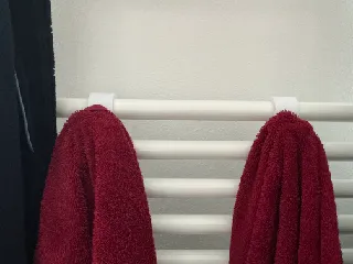 Radiator towel hook