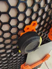 Honeycomb storage wall tape measure holder
