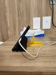 Universal phone/tablet stand with adjustable angle.