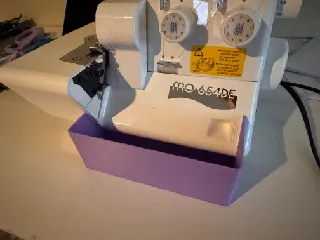 Juki MO 654-den scrap catcher