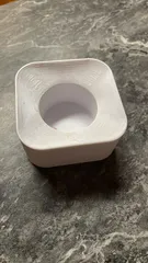 Yoghurt package holder for packages with top cap