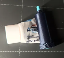Ratchet toothpaste tube squeezer