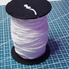 Spool for string and similar materials