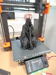 A STATUE OF A SITTING GHOST