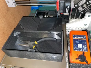 Solid storage box with origami folding lids.