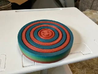 Customizable gyro toy wrapped with engraved text