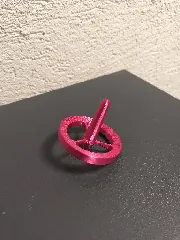 Orbital Spinning Tops