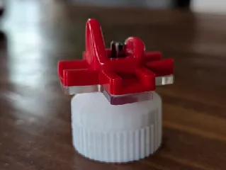 Chicken Watering Nipple ADAPTER to PET soft drink bottle (just the gray part in the photos)