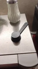Spoon for a Delonghi coffee machine