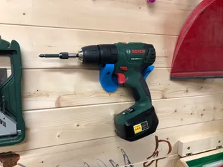 Universal cordless drill hanger