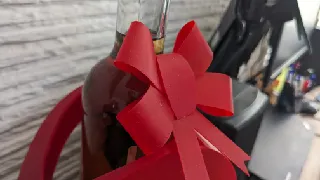 Folding gift bow