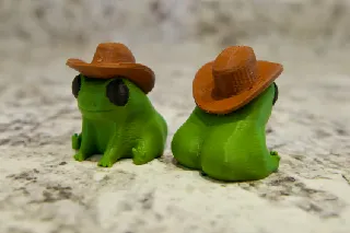 Fred the Frog but he's also a Thicc Cowboy