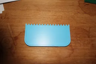 Tile adhesive spreader