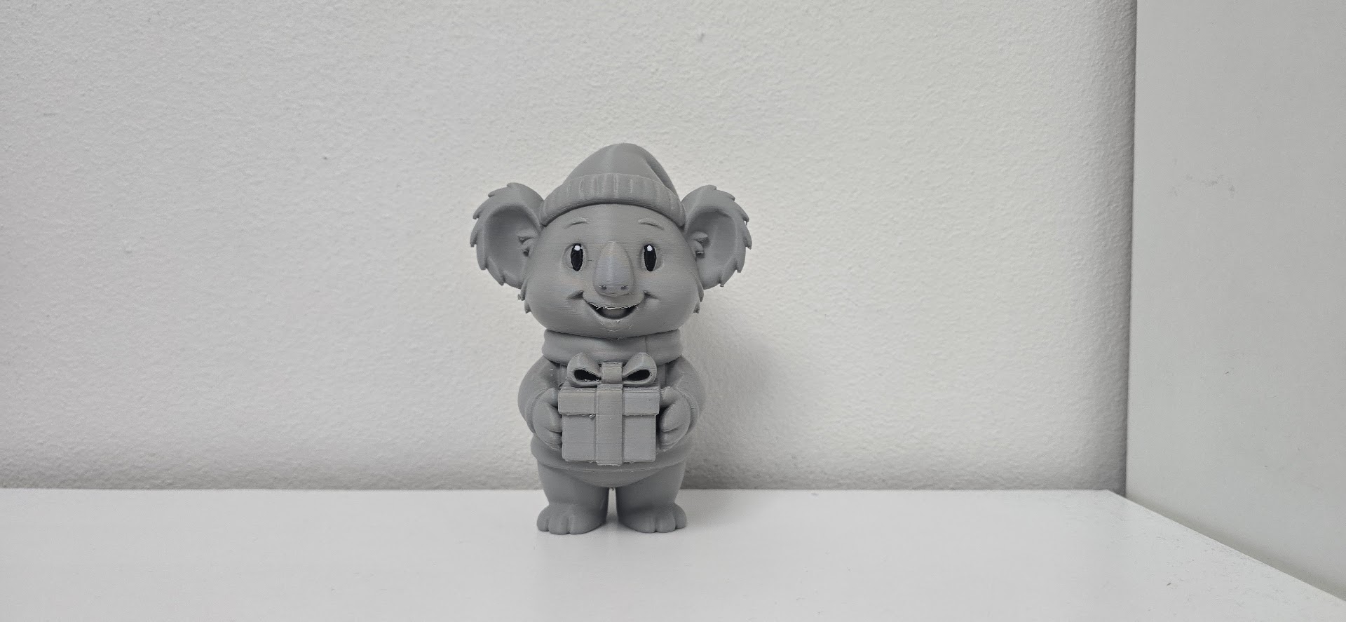 Koala with Gift and Santa Hat Holiday Figure