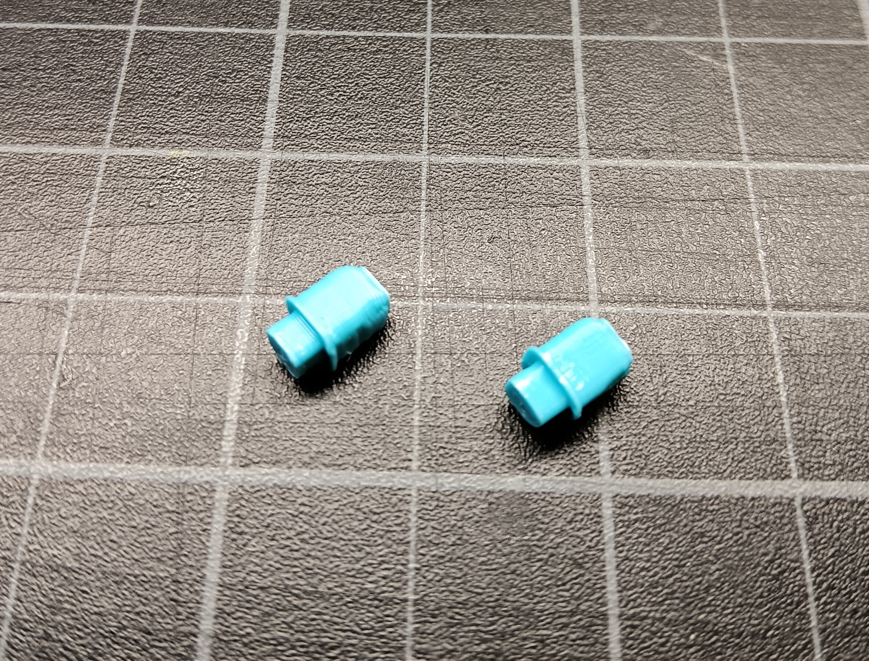 Breacher ejection port pegs