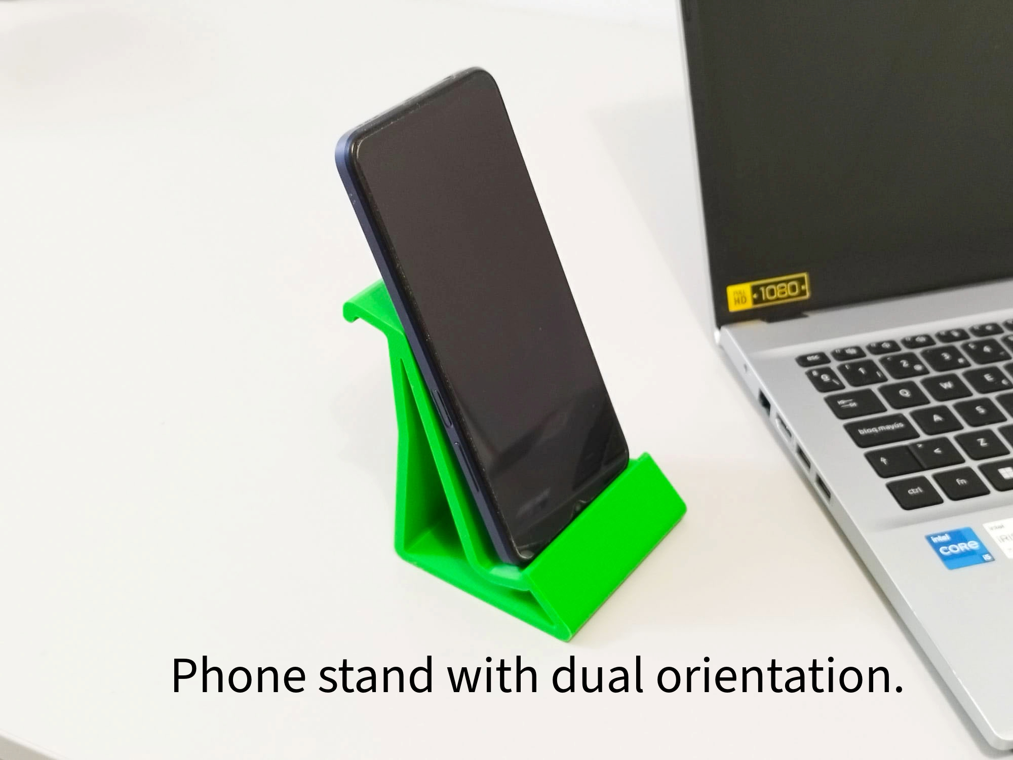 Phone holder in vertical and horizontal orientations
