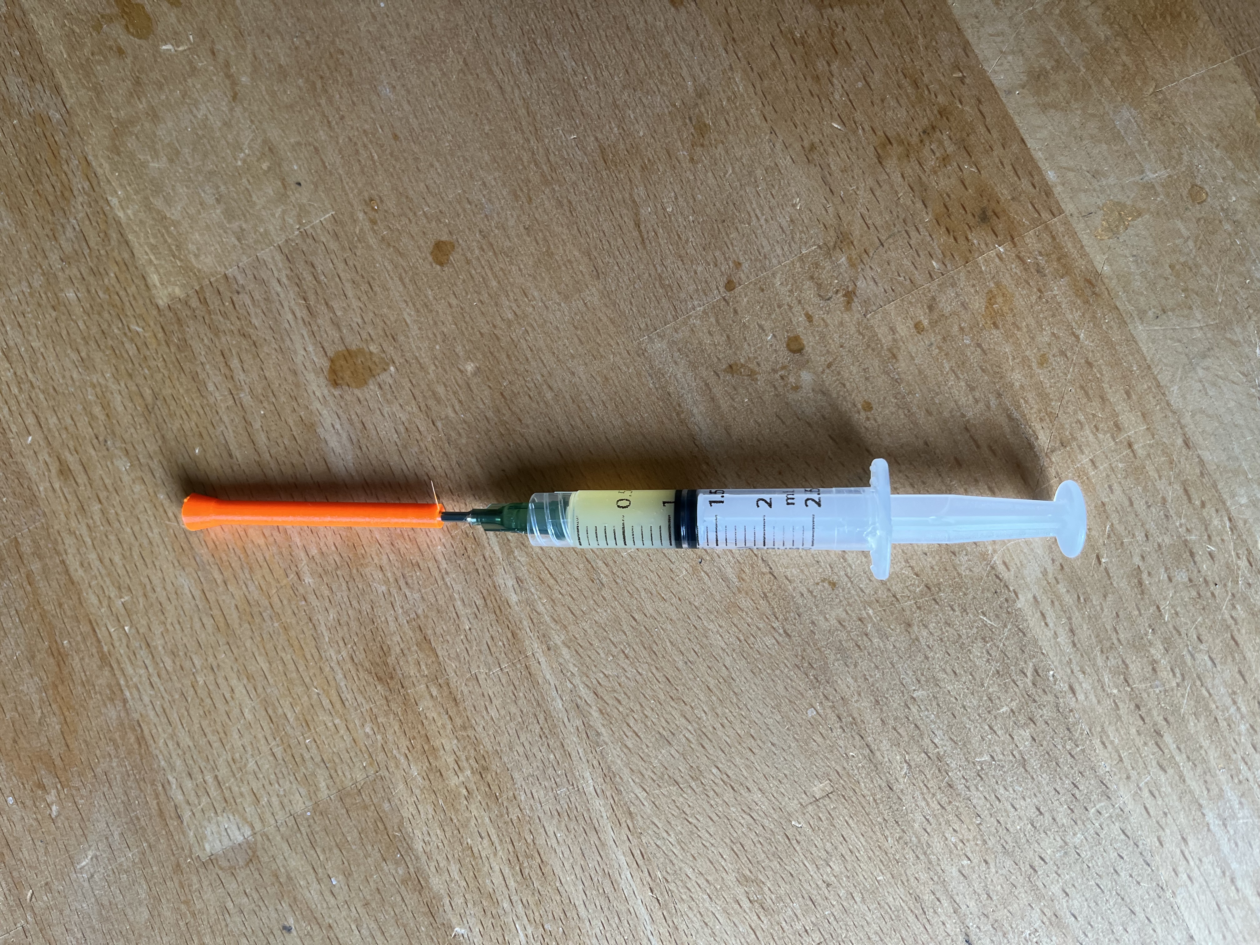 Needle cap for linear rail lubrication kit