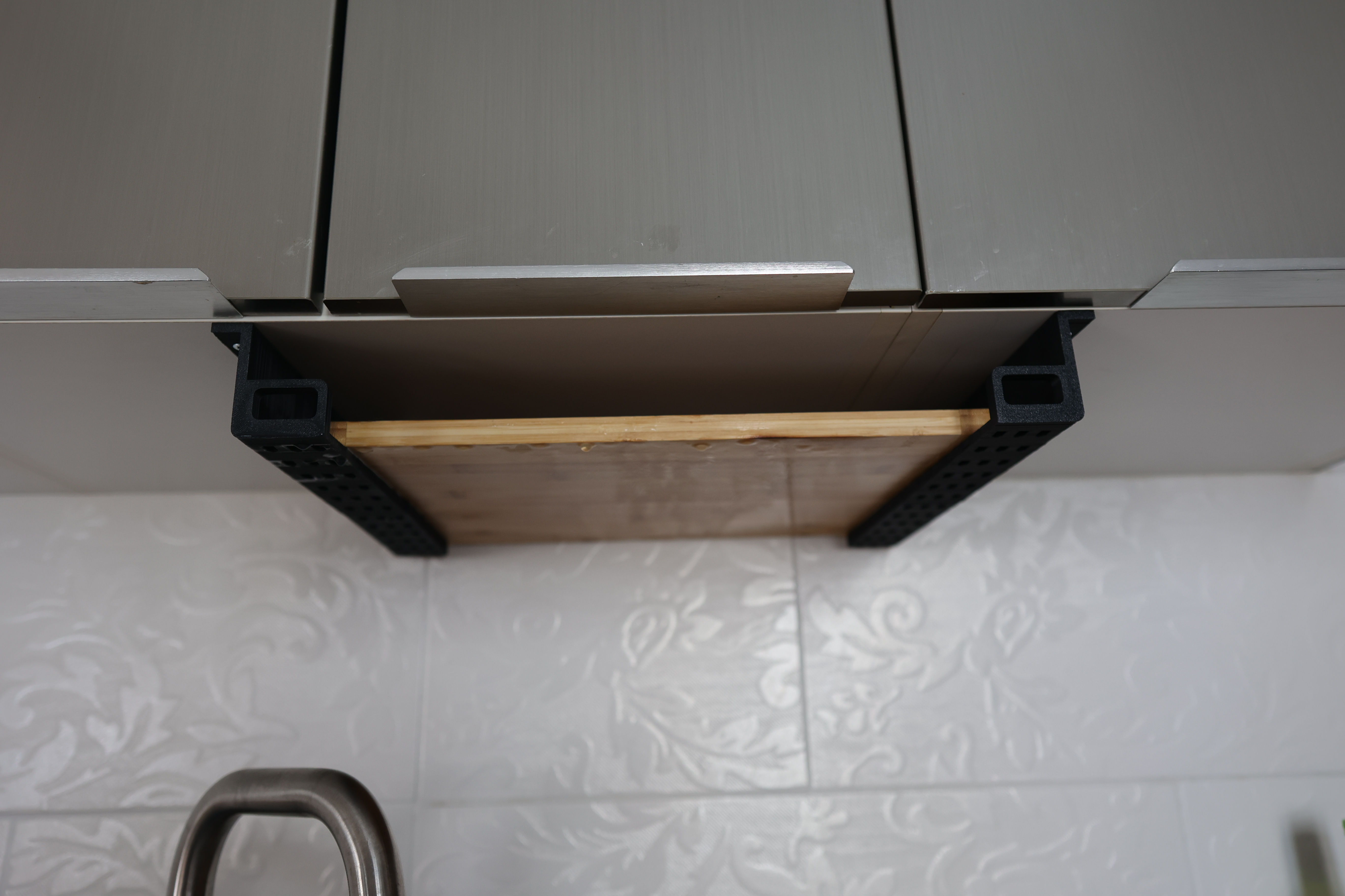 Cutting board holder (under cabinet)