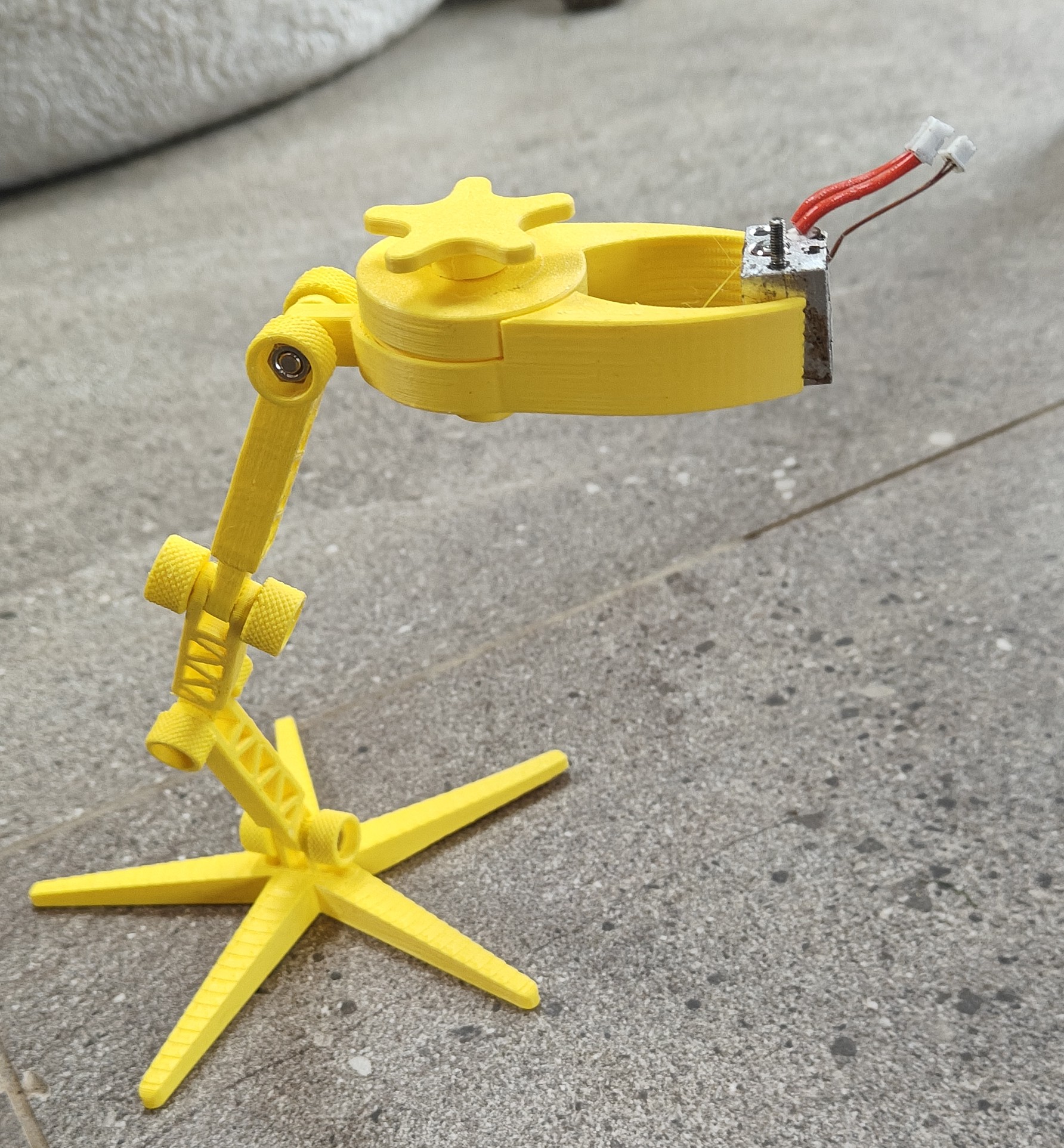 Hypocycloidal Clamp and Adjustable Arm