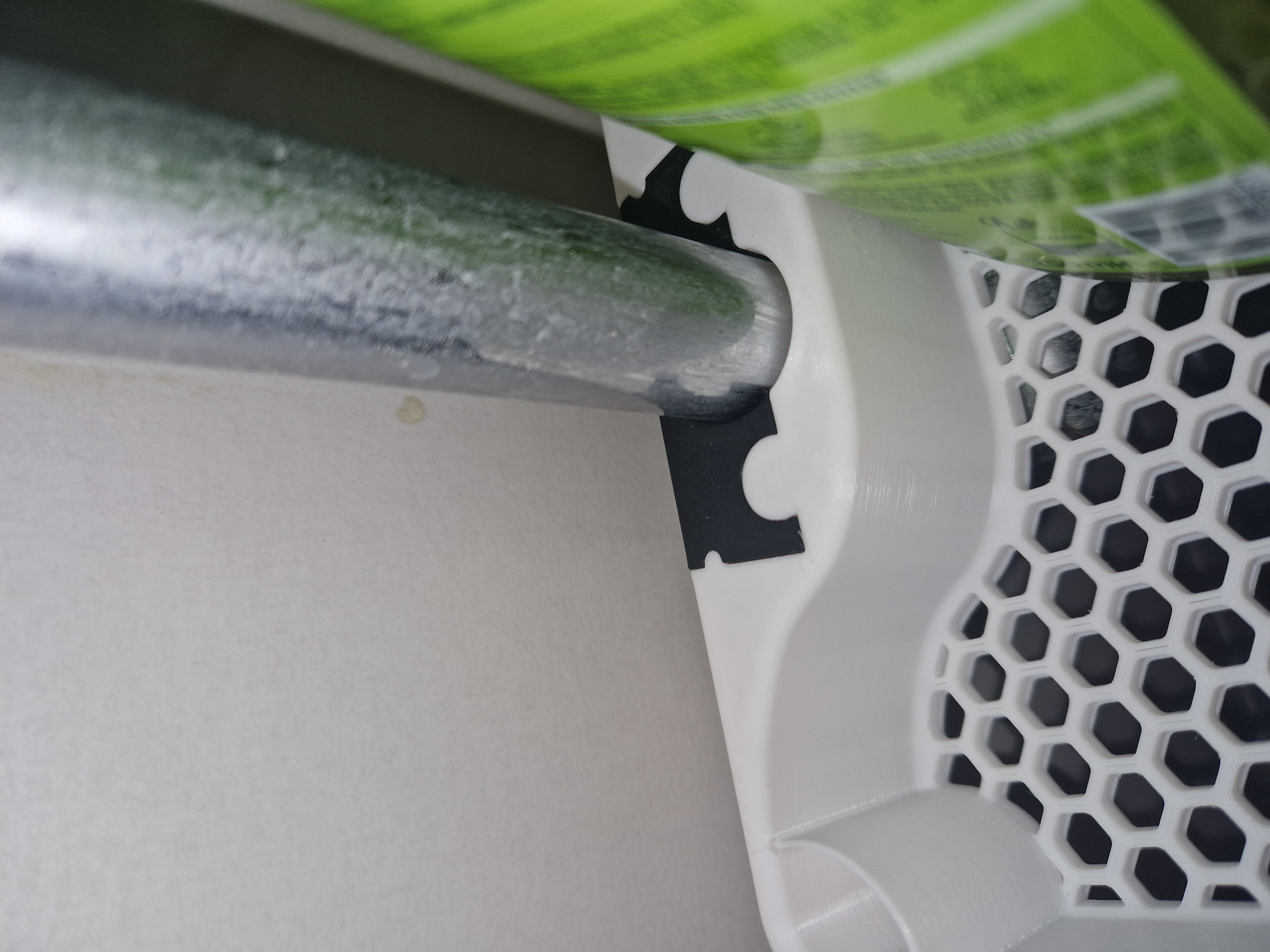 Honeycomb shower shelf with stronger clamp