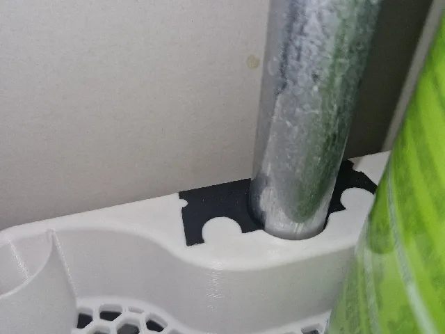 Honeycomb shower shelf with stronger clamp