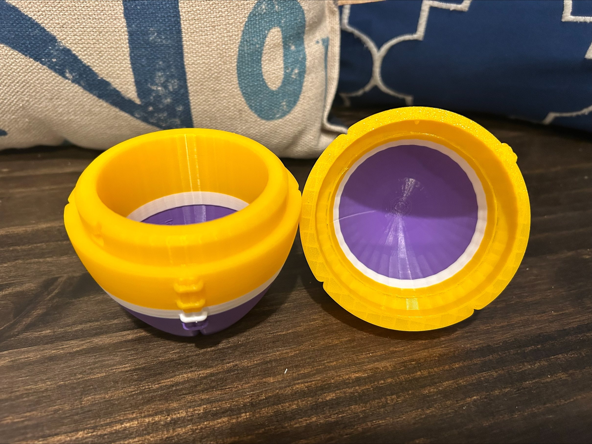 Football storage box with a quarter-turn rotating lock