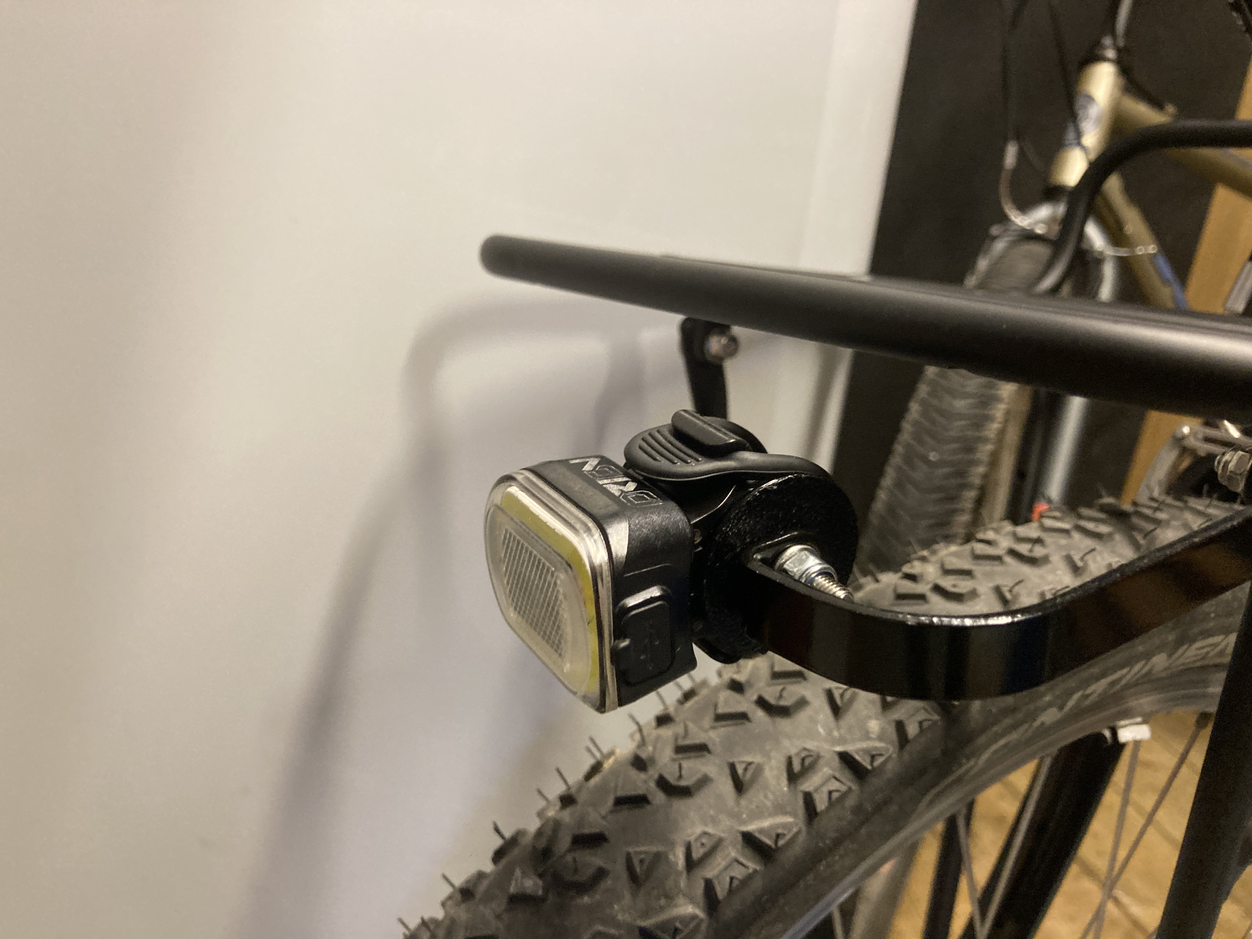 Bicycle front rack light mount seatpost adapter