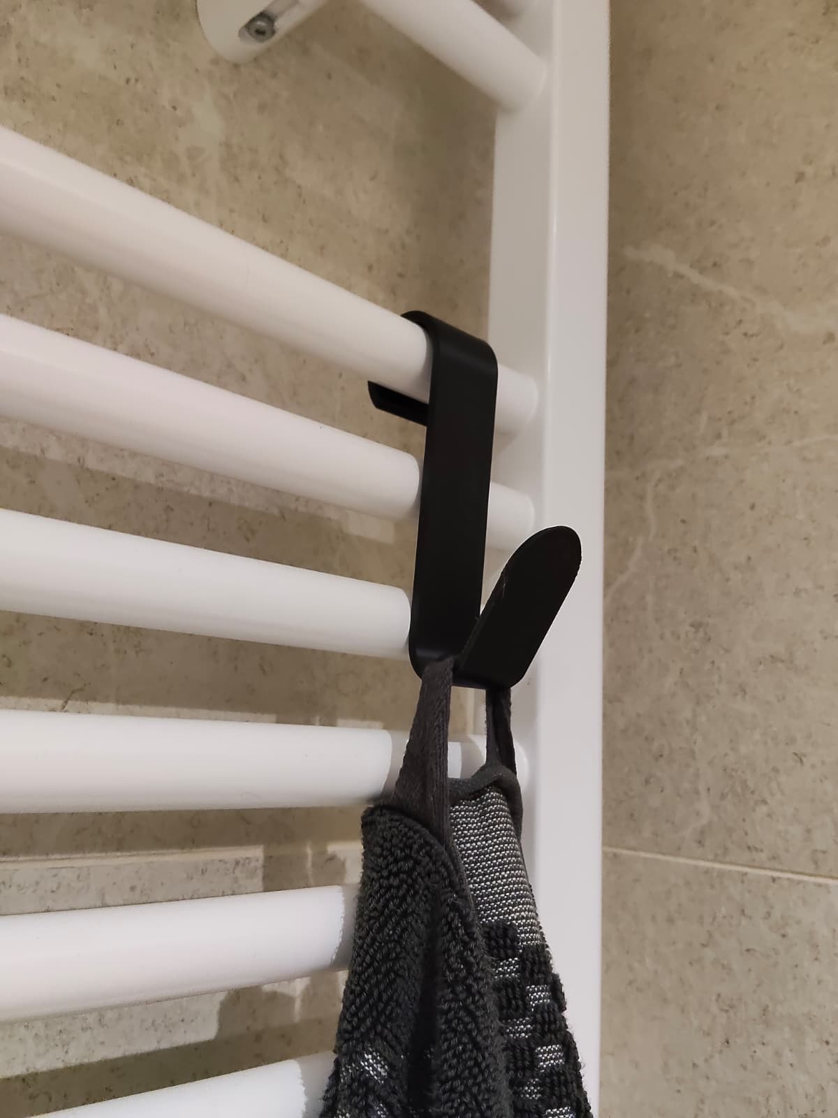Radiator towel hook