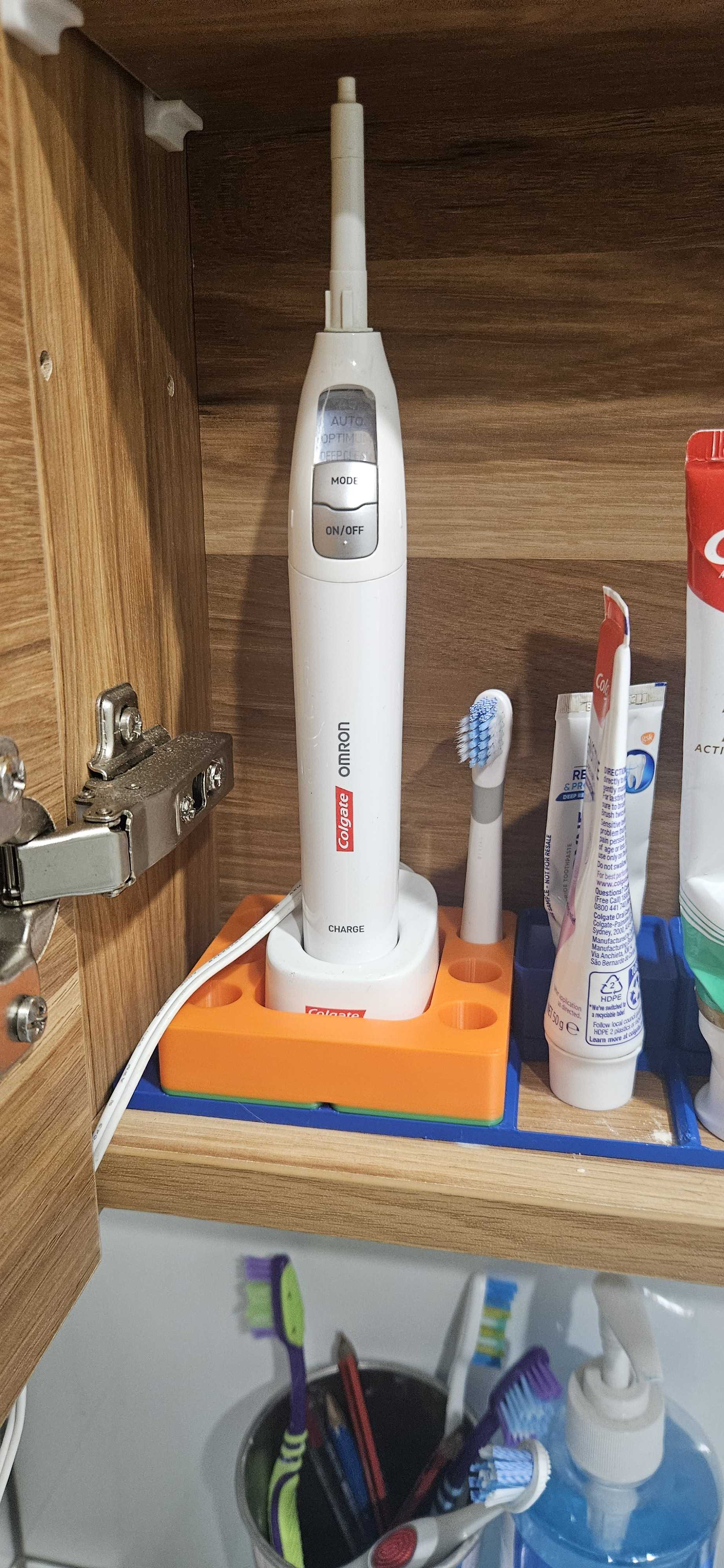 Gridfinity compatible Colgate Omron Toothbrush caddy with tip holders.
