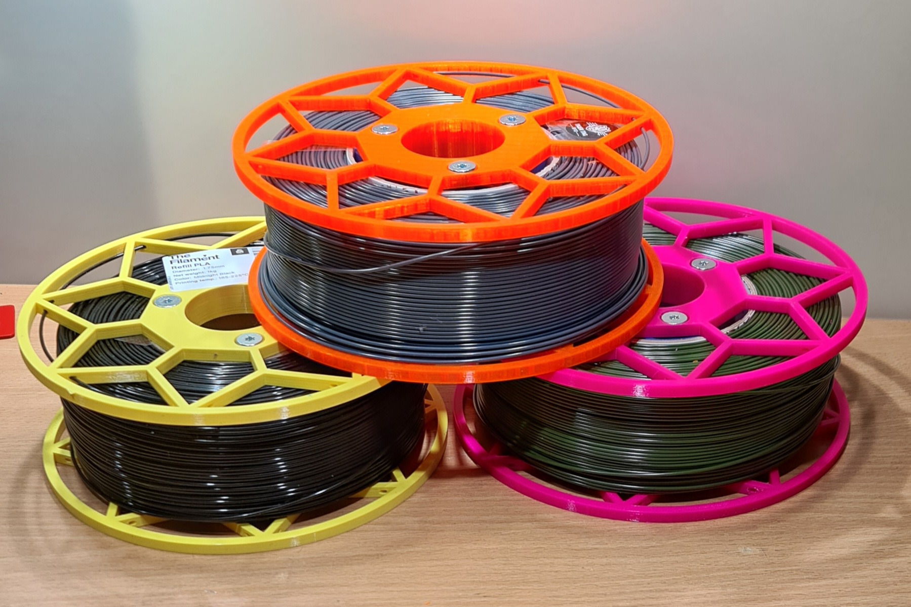 Universal spool for refill filament