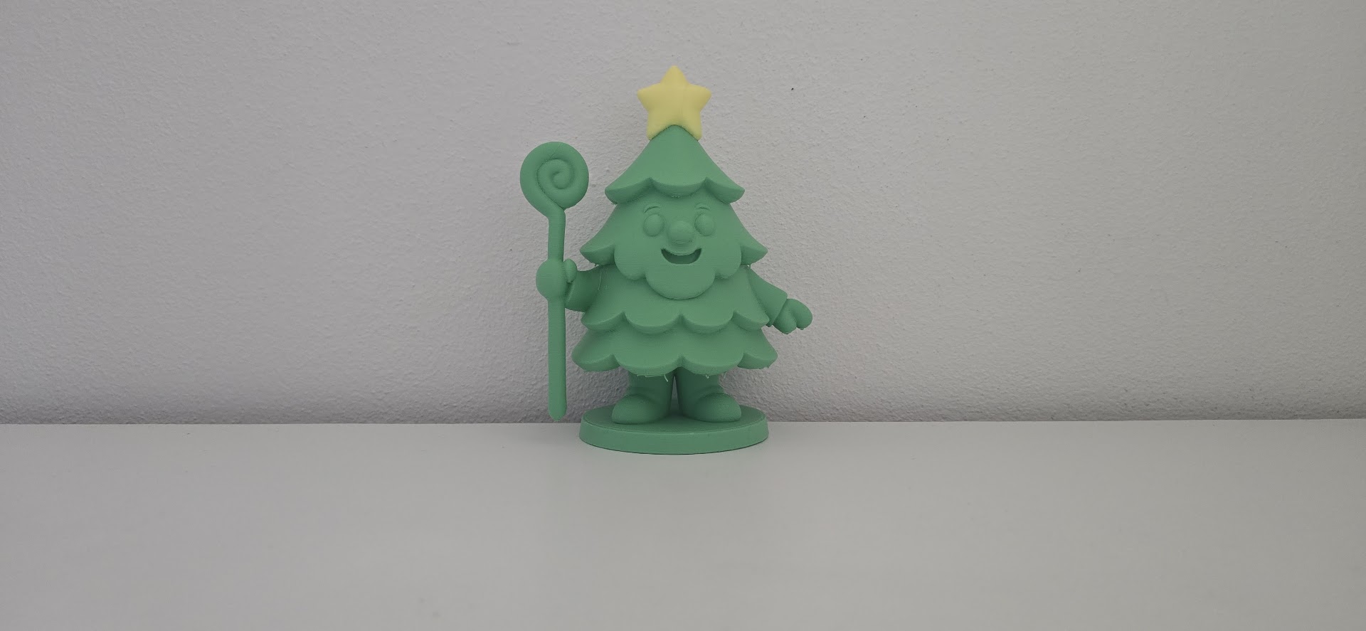 Smiling Christmas Tree Character with Staff and Star Figurine