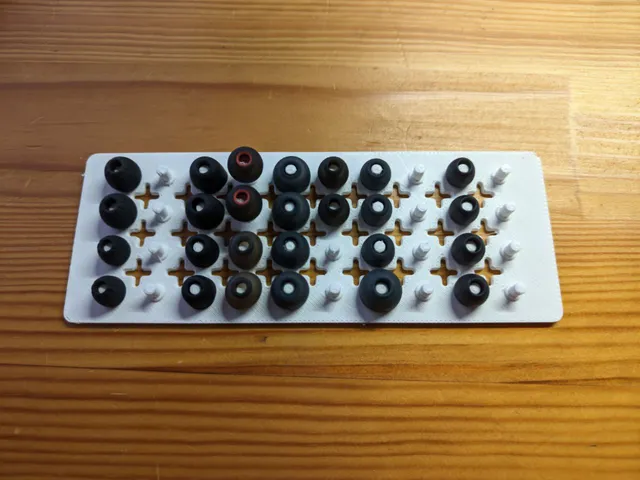 Headphone eartip holder