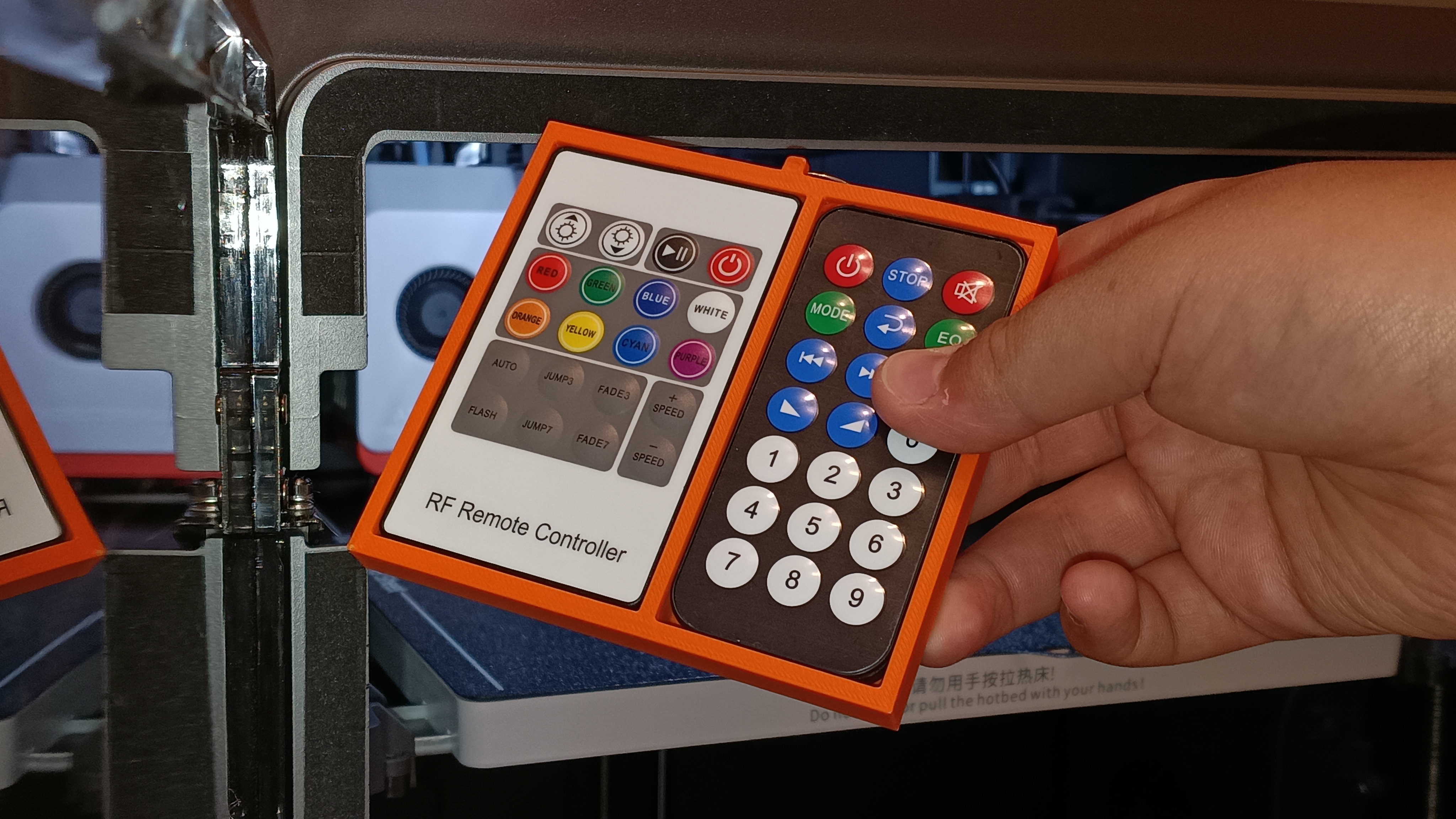 Uniwersal case/holder for LED strip and MP3/BT/FM module remote controllers.