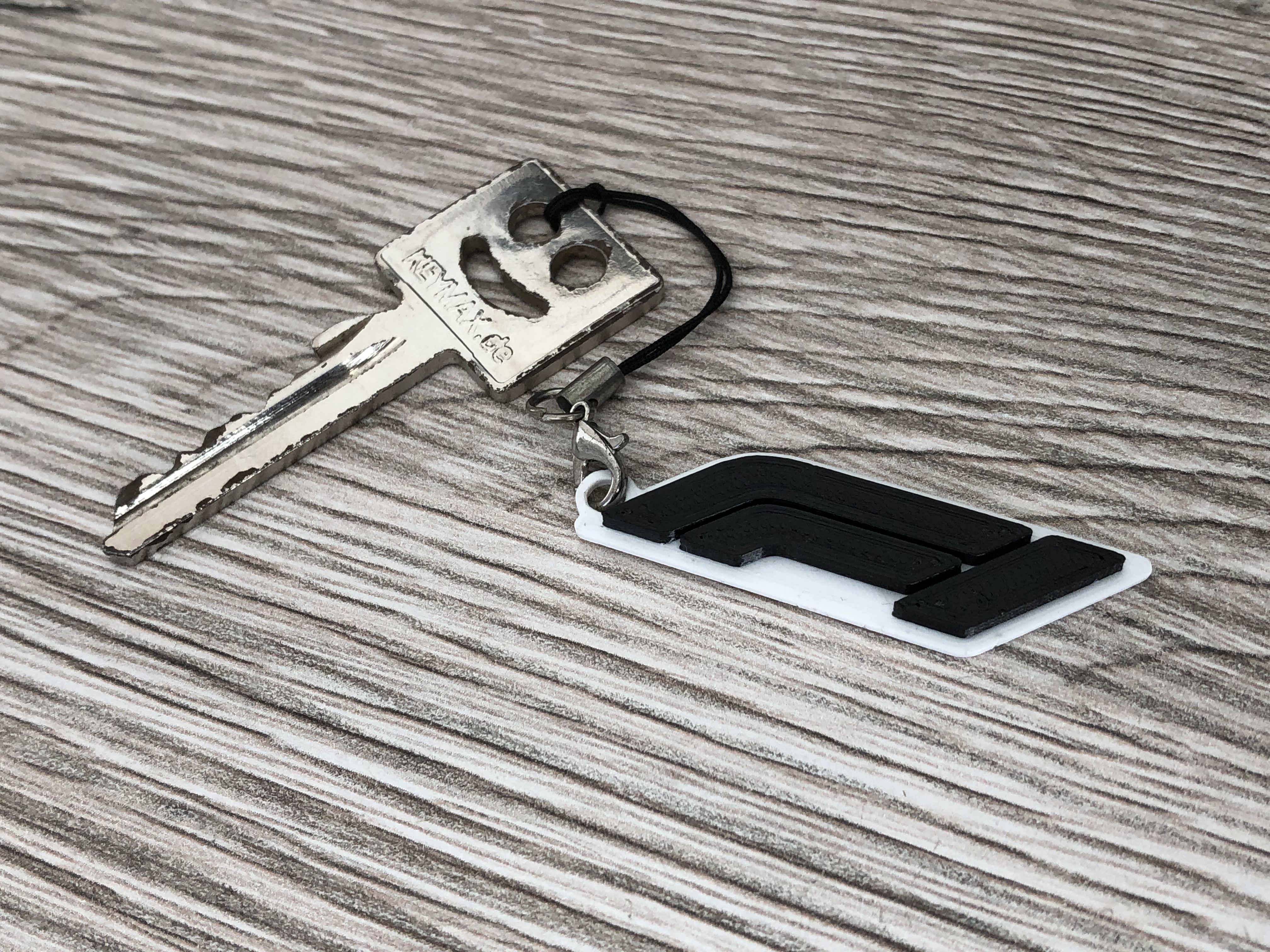 Easy filament change F1 logo keychain