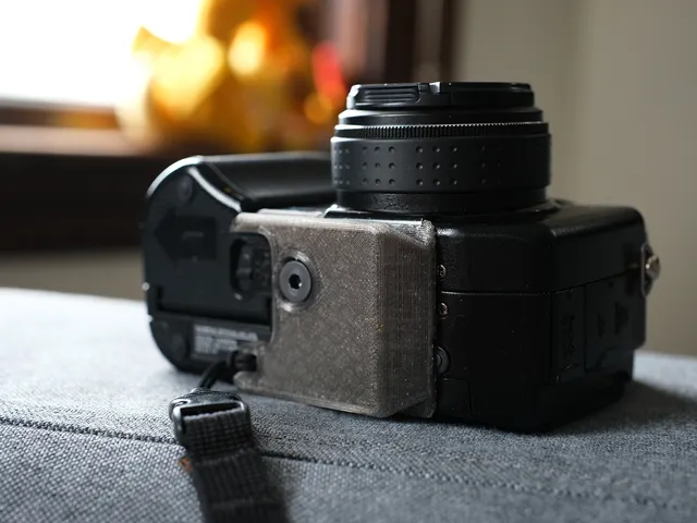 Olympus C-5050 compact arca tripod plate