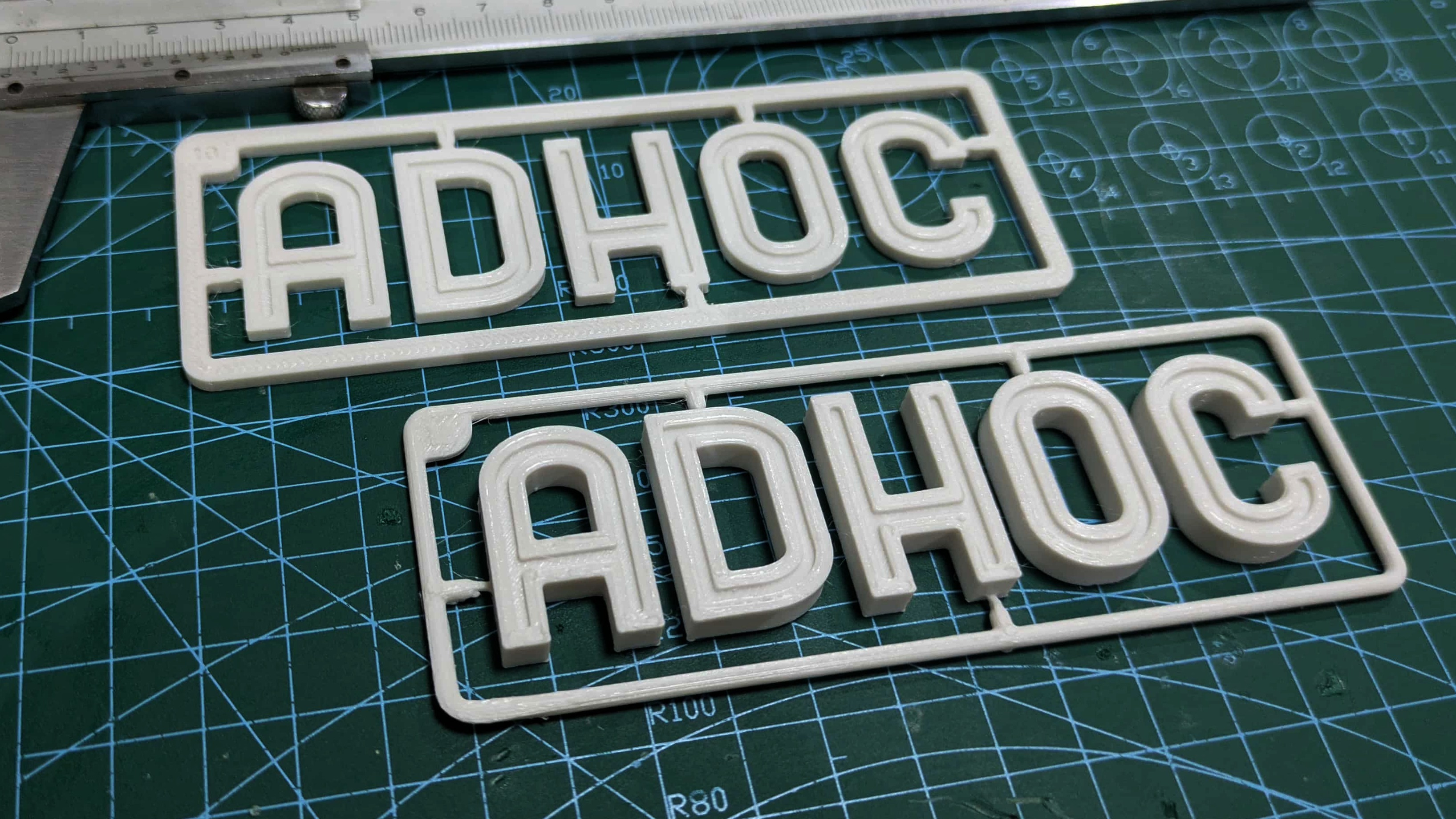 AdHoc Studio Model Kit Logo