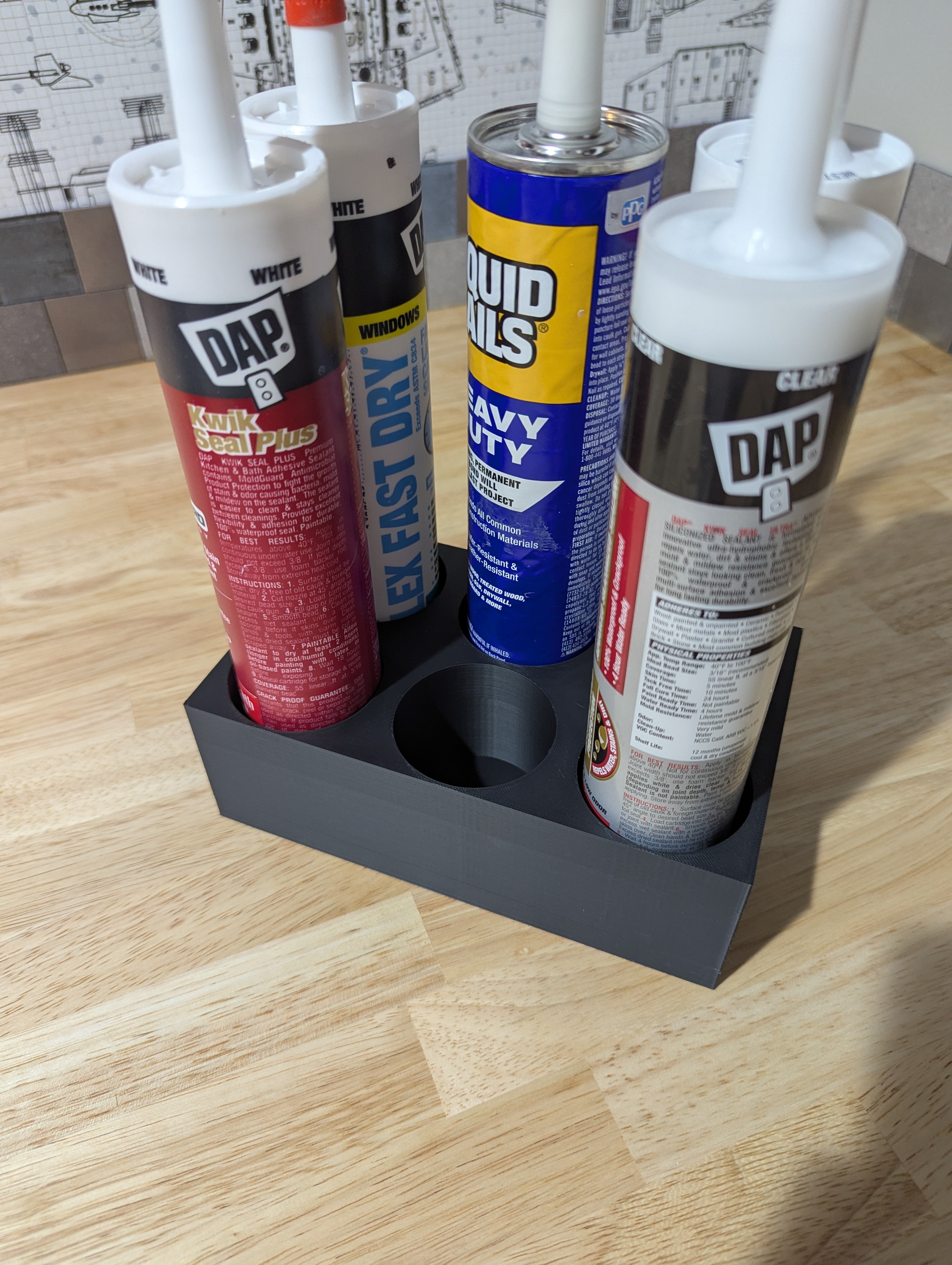 Caulk Holder
