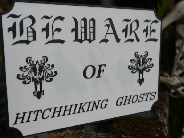 Beware Hitchhiking Ghosts - Spooky Sign