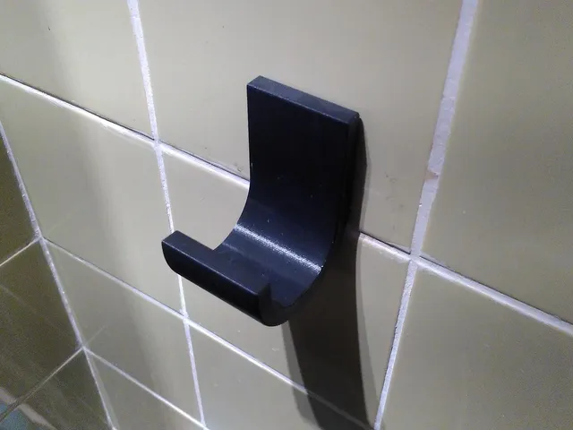 Towel- or cellphone holder/hook with wallmount