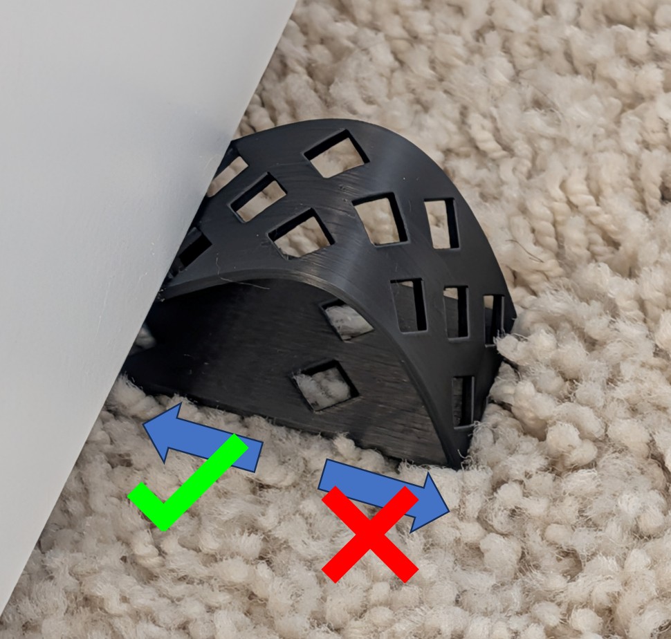 Doorstop for deep pile carpets