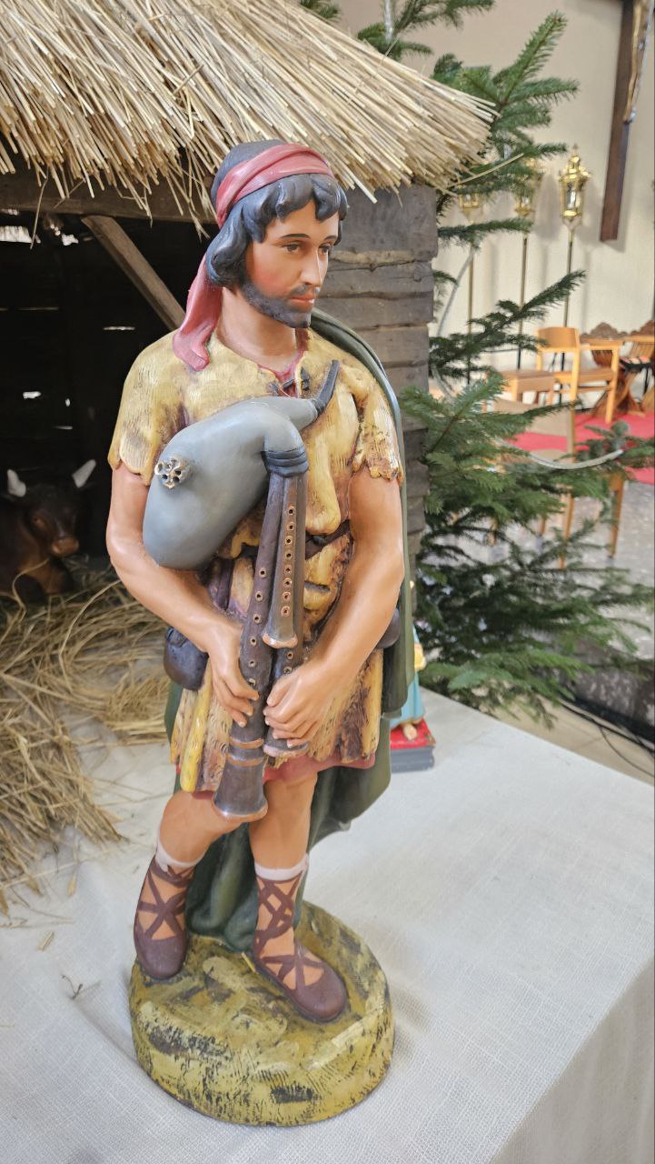 Shepherd with pipebag nativity scene