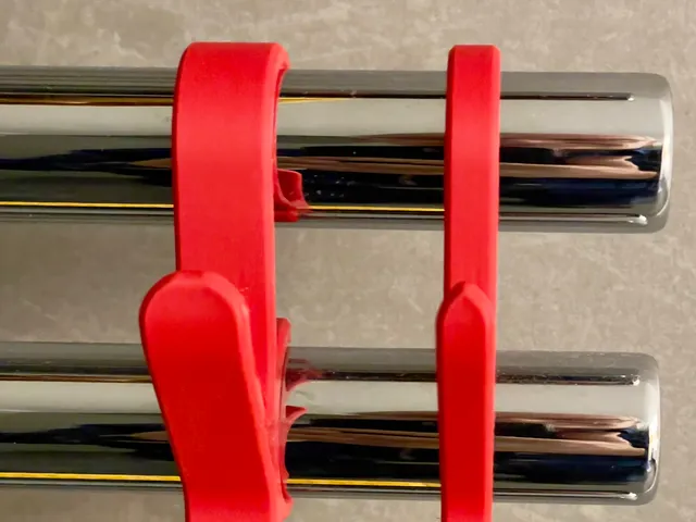 Bathroom towel radiator hook