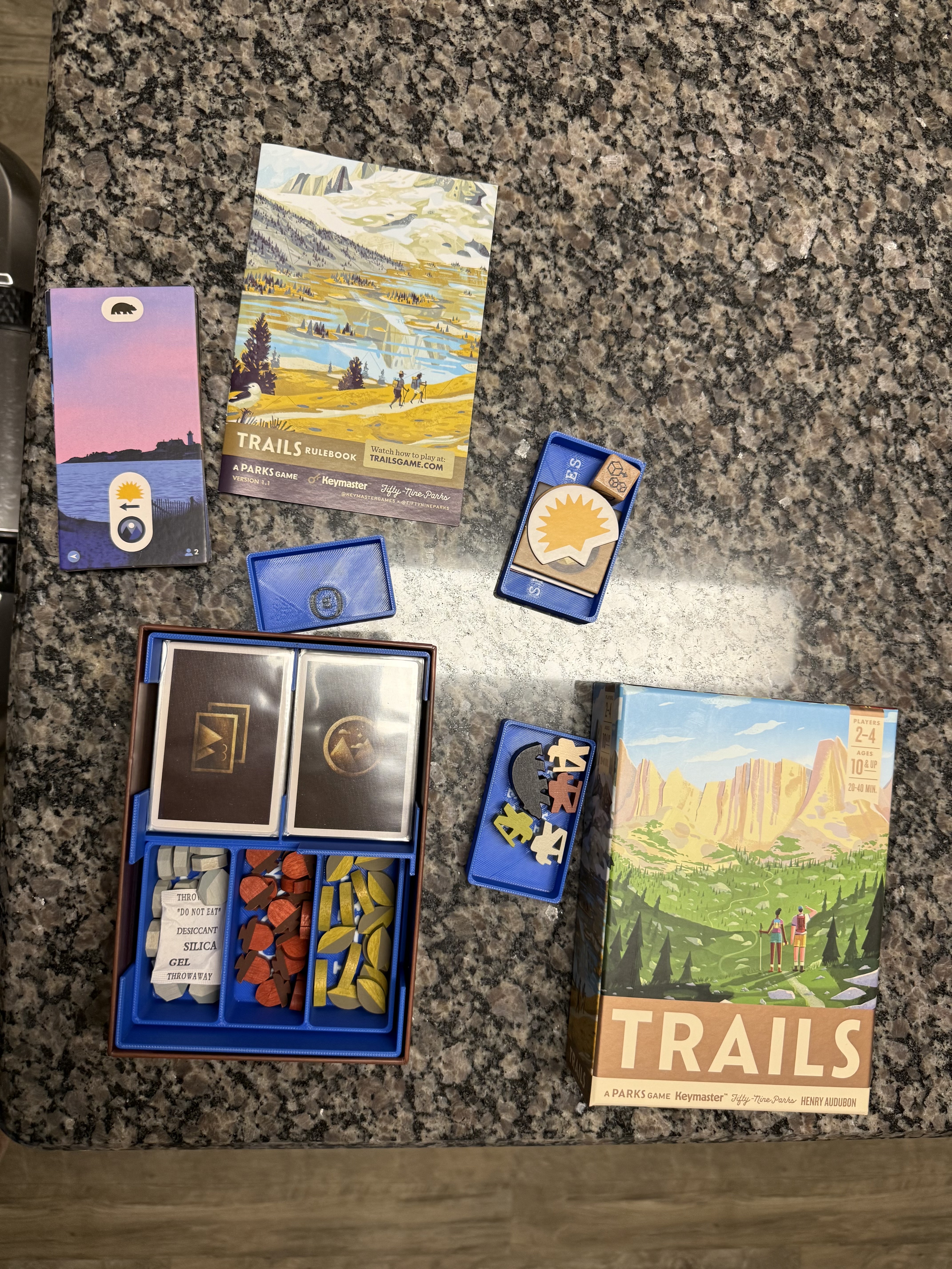 Trails insert that support sleeved cards, and wooden tokens