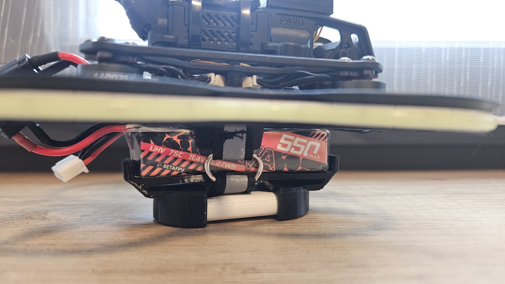 BetaFPV Pavo20 Pro LiPo Guard with Samsung SmartTag2 holder
